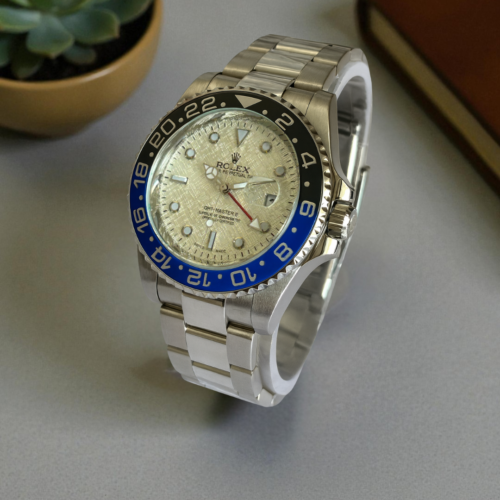 Rolex GMT Silver Chain Black/Blue Bezel White Dial